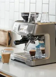 Maria's Sage Barista Express brewing coffee